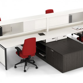 White workstation with red ergonomic chairs